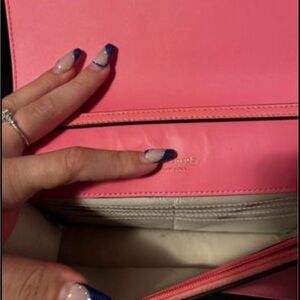 Like new Kate spade purse. Do not sell this color anymore! I paid 300 for it.